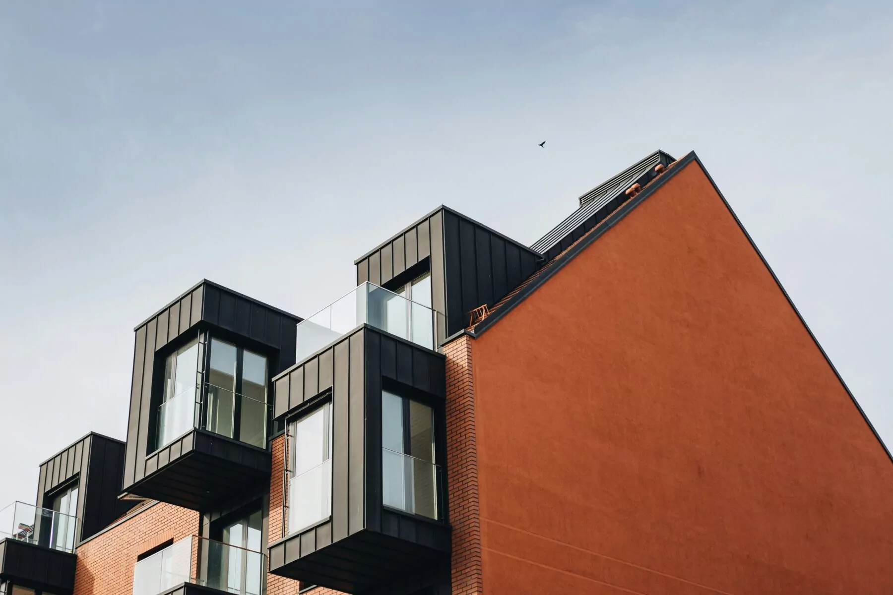 orange and black building purtruding balconies- types of liens 