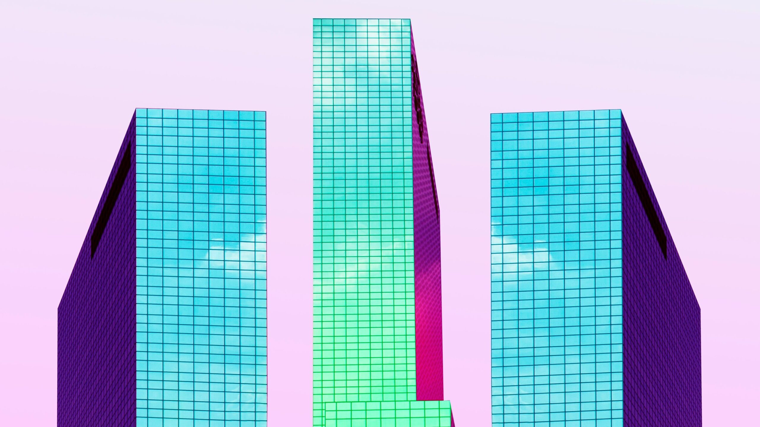 three chameleon colored skyscrapers on blue-pink gradient -types of liens article