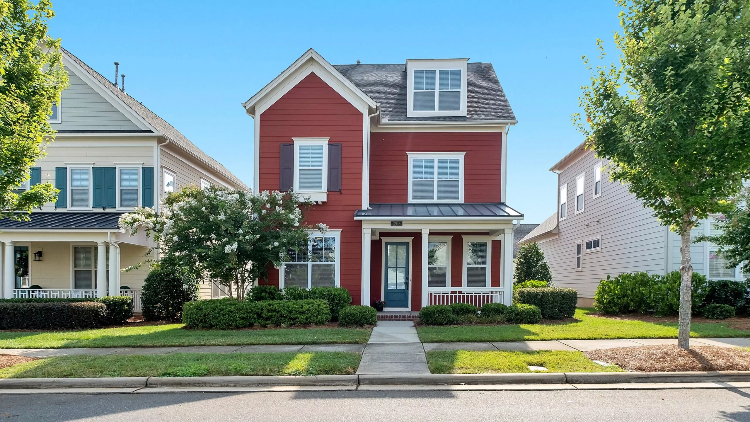 what does sfr mean in real estate-red house with gray roof on a street in spring mortgage payoff